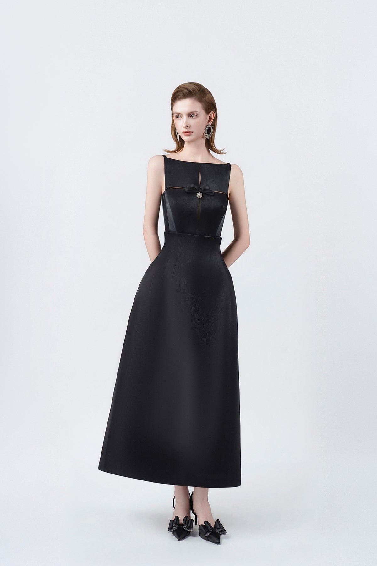black A-line midi dress, DeTHEIA De Nona Cometa