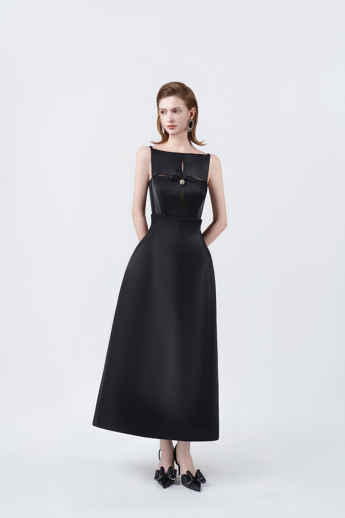 black A-line midi dress, DeTHEIA De Nona Cometa