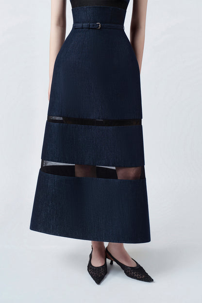 flared embroidered hem of the denim-blue midi dress, DeTHEIA