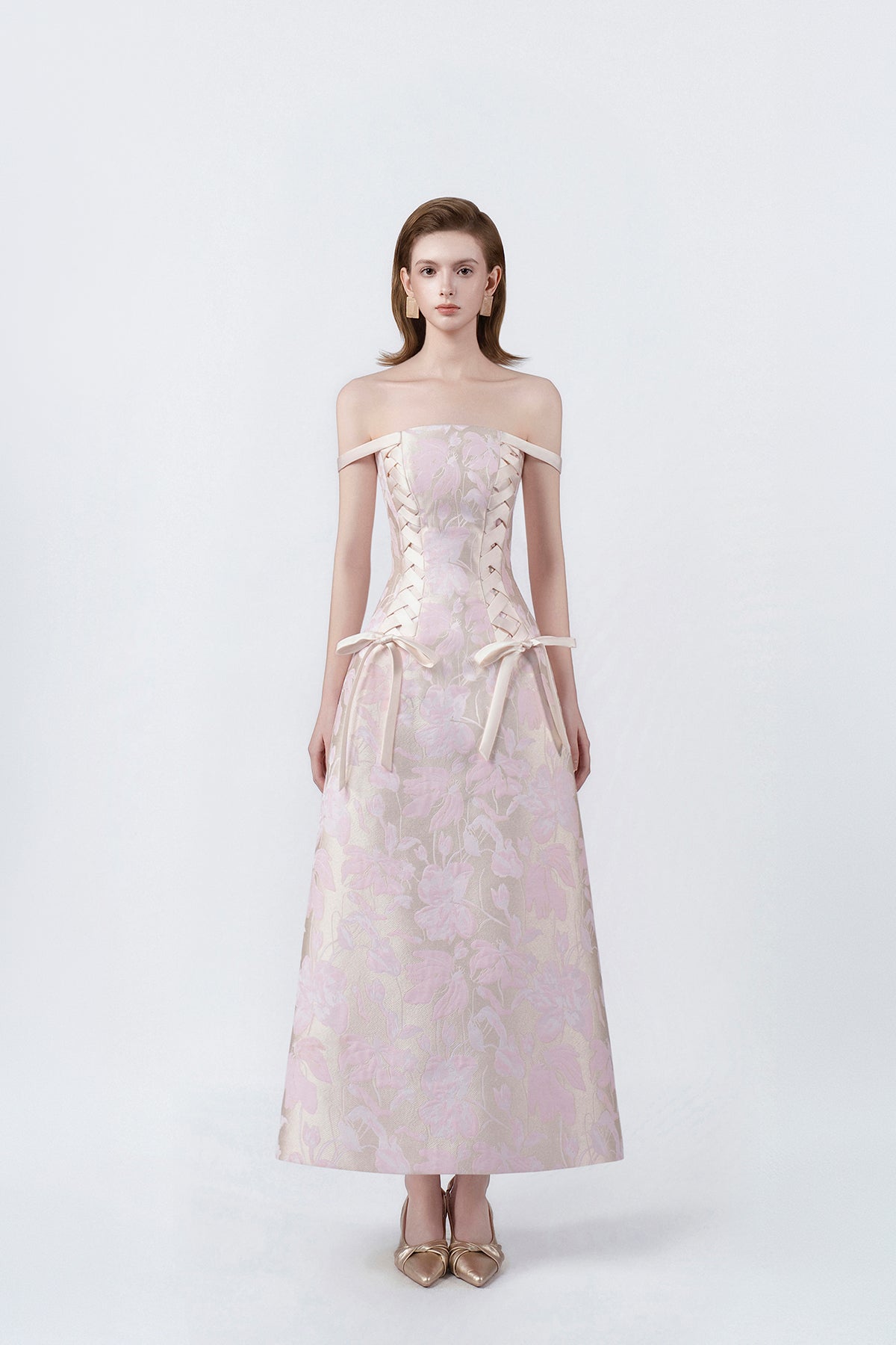 model in a pink off-the-shoulder lace midi dress, DeTHEIA