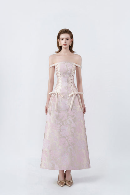 model in a pink off-the-shoulder lace midi dress, DeTHEIA