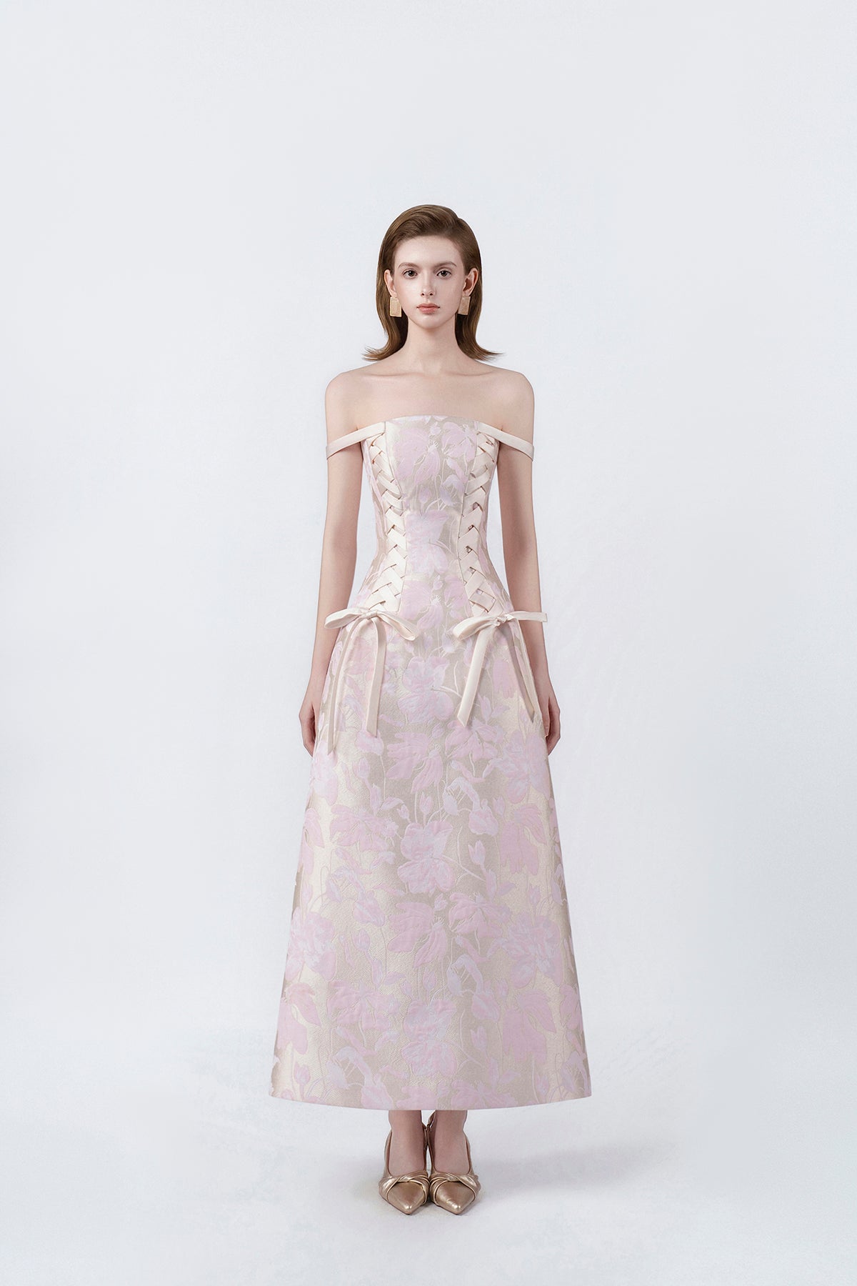 model in a pink off-the-shoulder lace midi dress, DeTHEIA