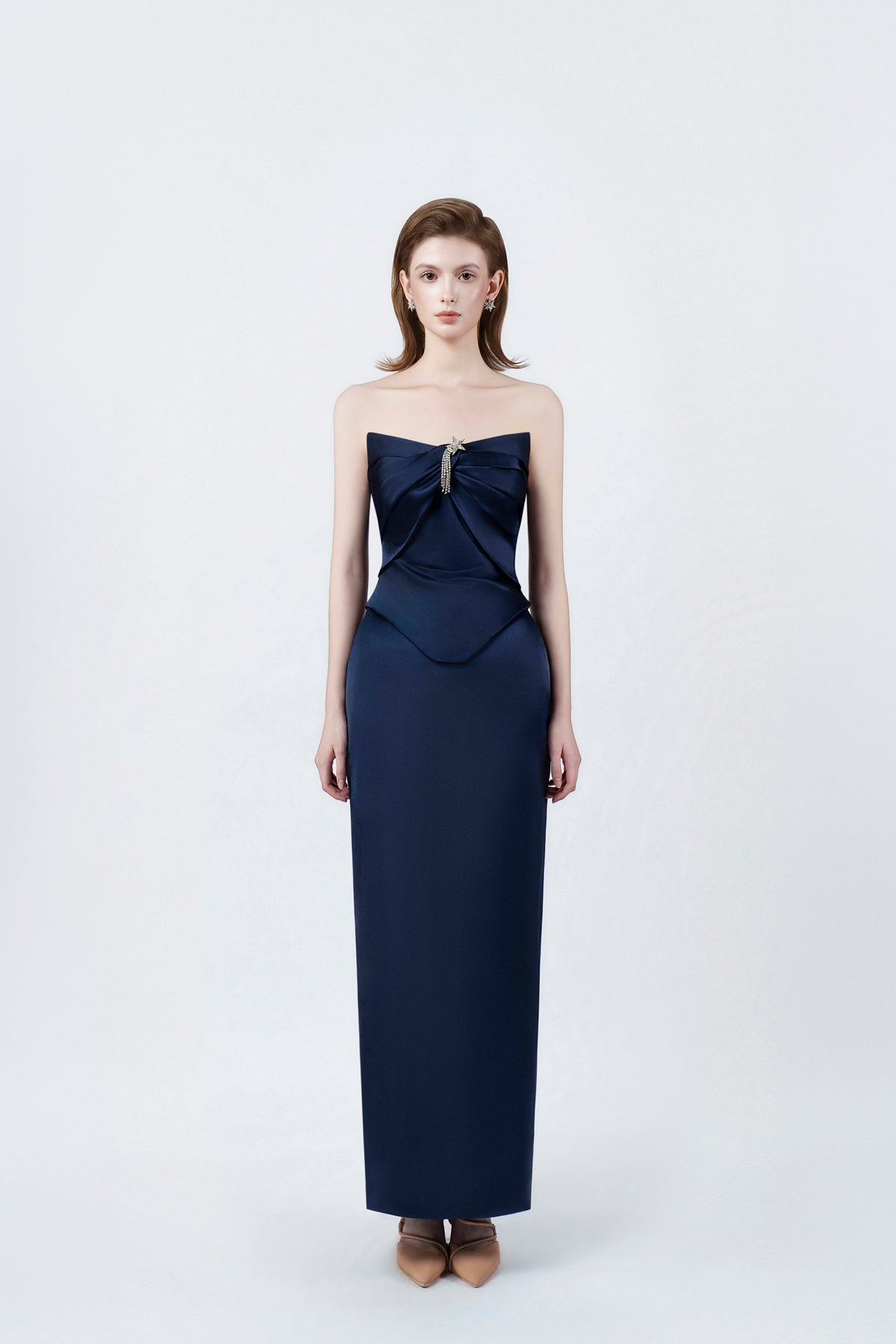 model in a navy strapless sweetheart pencil midi dress, DeTHEIA