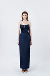 model in a navy strapless sweetheart pencil midi dress, DeTHEIA