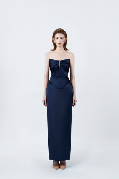 model in a navy strapless sweetheart pencil midi dress, DeTHEIA
