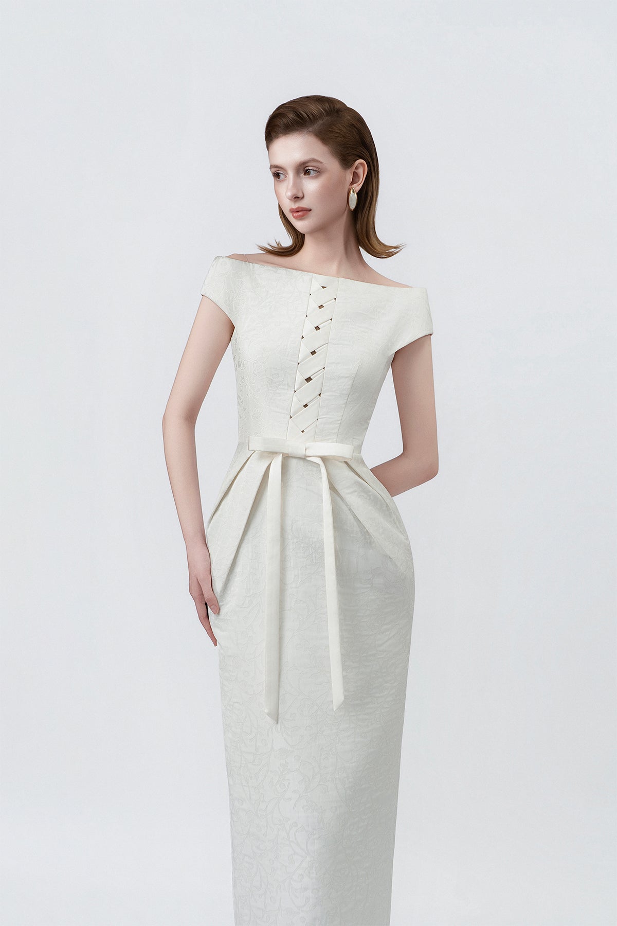 boat neckline and button trim on ivory, DeTHEIA