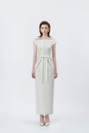 model in an ivory boat-neck pencil midi dress, DeTHEIA