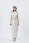 model in an ivory boat-neck pencil midi dress, DeTHEIA