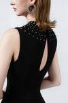black A-line midi dress with embellished neckline, DeTHEIA