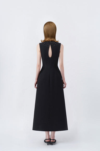 black A-line midi dress with back zip, DeTHEIA De Nona Cometa