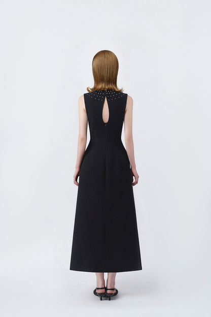 black A-line midi dress with back zip, DeTHEIA De Nona Cometa
