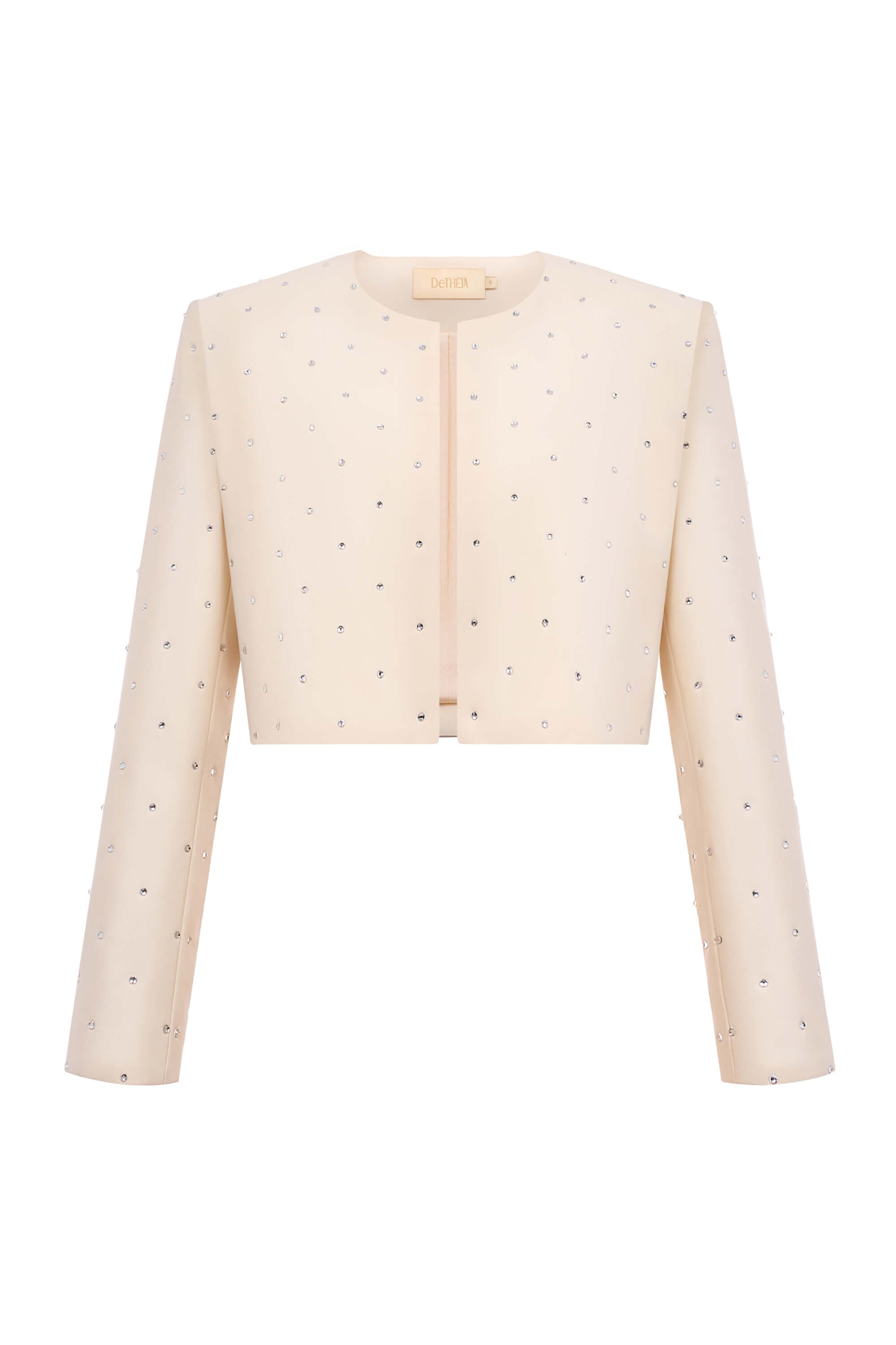 Beige jacket with small black patterns on a white background