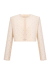 Beige jacket with small black patterns on a white background