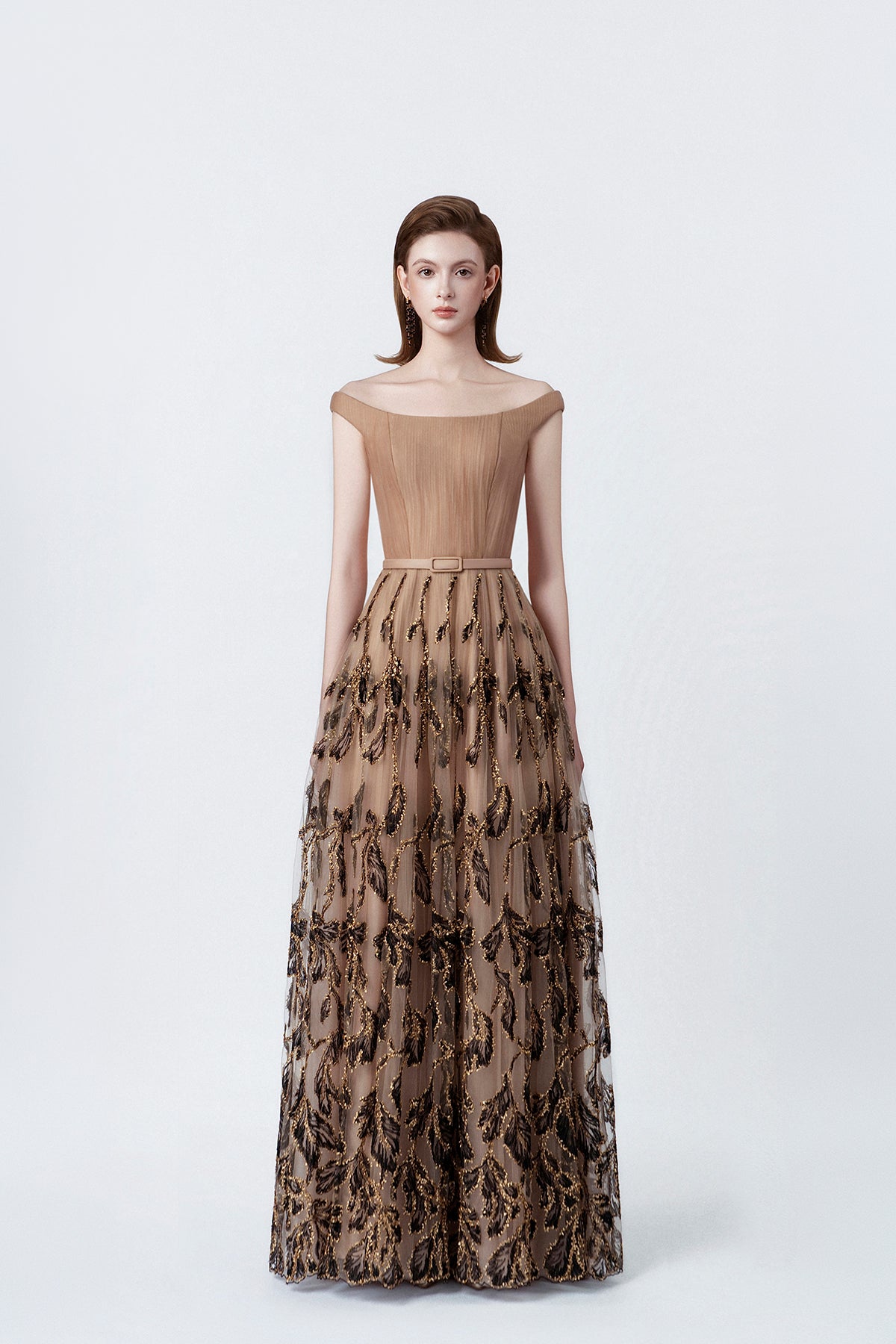 model in a nude boat-neck embellished maxi dress, DeTHEIA