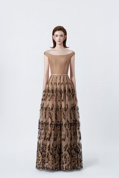 model in a nude boat-neck embellished maxi dress, DeTHEIA