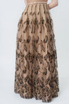 tiered fringed embellishment on the nude maxi, DeTHEIA
