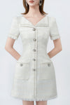 white A-line mini dress with buttons, DeTHEIA