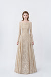 model in a beige off-the-shoulder long-sleeve maxi dress, DeTHEIA