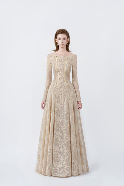 model in a beige off-the-shoulder long-sleeve maxi dress, DeTHEIA