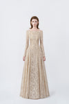 model in a beige off-the-shoulder long-sleeve maxi dress, DeTHEIA